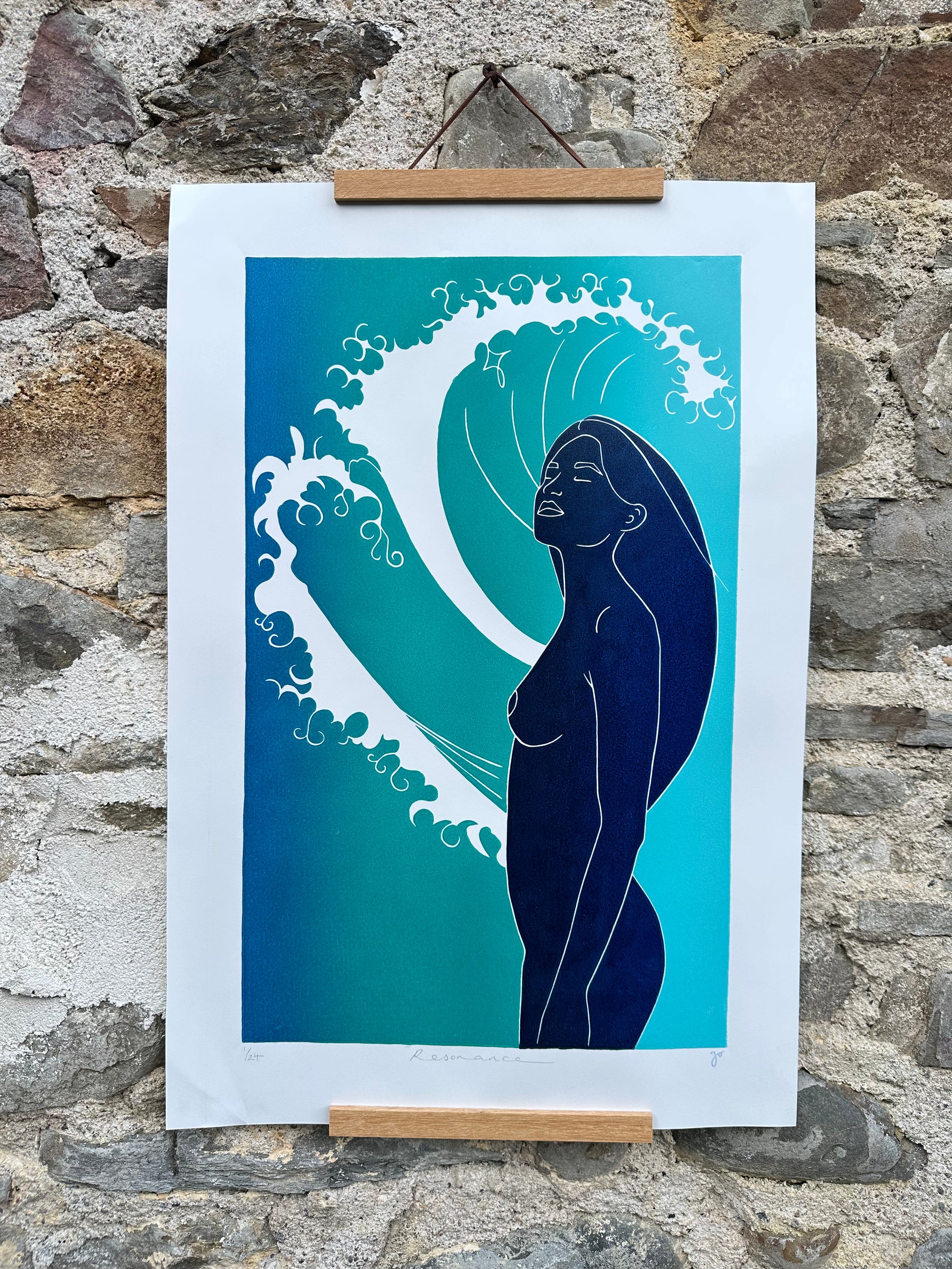 Two-layer linocut reduction print of a nude woman with closed eyes, standing beside a stylised turquoise wave, inspired by Sara Teasdale's poem 'The Voice'. 